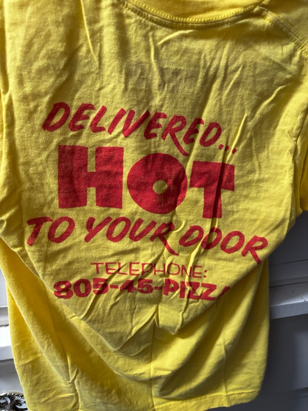 Yellow Graphic Tee with Red 'Delivered... HOT To Your Door' Print